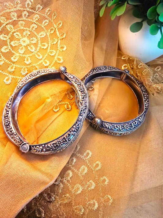 Dual Tone Silver Replica Openable Bangles in pair – Antique Gold & Oxidized Floral Engraved Kada Pair