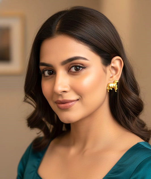 Gold Cow Motif Stud Earrings